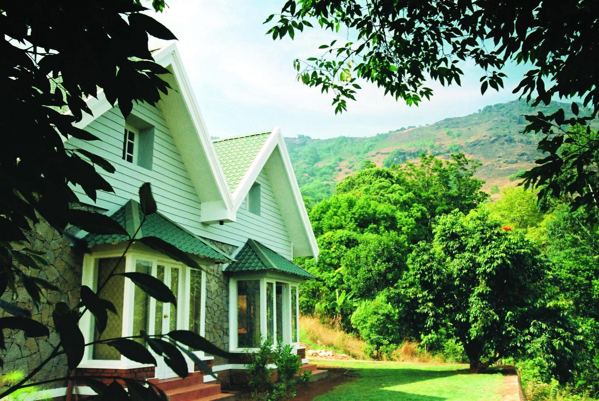 Hotel Ambady Estate à Munnar Extérieur photo