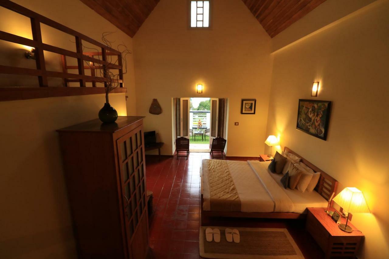 Hotel Ambady Estate à Munnar Extérieur photo