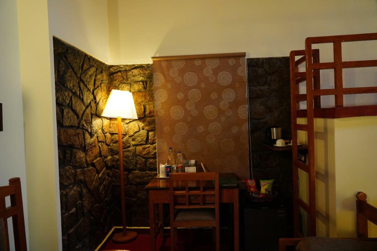 Hotel Ambady Estate à Munnar Extérieur photo